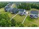 An aerial view of beautiful homes with big yards in a well-maintained neighborhood at 74 Permit Ct, Chapel Hill, NC 27517