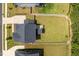 Aerial view of a home showcasing its expansive backyard and architectural details at 74 Permit Ct, Chapel Hill, NC 27517