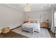 Charming bedroom featuring a comfortable bed, soft lighting, and minimalist decor, creating a relaxing retreat at 74 Permit Ct, Chapel Hill, NC 27517
