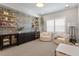 Stylish playroom with colorful wallpaper, shelving, comfortable seating, and a playful atmosphere at 74 Permit Ct, Chapel Hill, NC 27517