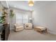 Cozy playroom featuring comfortable seating, soft lighting, and a minimalist decor at 74 Permit Ct, Chapel Hill, NC 27517