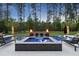 Stunning backyard pool with spa and relaxing lounge chairs at 7545 Hasentree Club Dr, Wake Forest, NC 27587