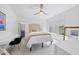 Bright bedroom with desk, vanity, and view of en-suite bathroom at 7545 Hasentree Club Dr, Wake Forest, NC 27587