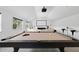 Beautiful game room with pool table, bar stools, and seating at 7545 Hasentree Club Dr, Wake Forest, NC 27587