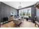 Well-appointed office featuring hardwood floors, attractive wallpaper, built-in cabinetry, and ample natural light at 7545 Hasentree Club Dr, Wake Forest, NC 27587
