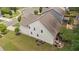 Aerial view of the property showcasing the backyard and patio at 8132 Wheeler Woods Dr, Apex, NC 27539