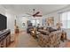 Cozy living room showcasing a comfortable seating area and lots of natural light at 8132 Wheeler Woods Dr, Apex, NC 27539