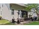 View of the screened in porch with an outdoor dining space at 8132 Wheeler Woods Dr, Apex, NC 27539