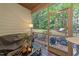 Relaxing screened porch with views of the backyard at 8132 Wheeler Woods Dr, Apex, NC 27539