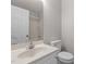 Neutral bathroom offers a single sink vanity and shower-tub combo at 820 Water Plant Rd, Zebulon, NC 27597