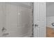 Bathroom offers a tub and shower combination with a shower curtain at 820 Water Plant Rd, Zebulon, NC 27597