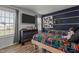 bedroom with comic book themed decor, a large TV, and natural light at 820 Water Plant Rd, Zebulon, NC 27597