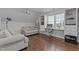 Lofted bonus room featuring built-in shelves, workspace, and comfortable seating at 820 Water Plant Rd, Zebulon, NC 27597