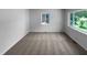 Bright bedroom with neutral walls and plush carpeting provides a serene and comfortable atmosphere at 916 Waring St, Durham, NC 27704
