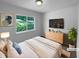 Comfortable staged main bedroom with natural light, modern furnishings, and stylish decor creating a relaxing retreat at 916 Waring St, Durham, NC 27704
