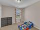 bedroom features a dresser and toddler bed at 960 Sandyhill Rd, Wendell, NC 27591