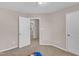Empty bedroom features carpet flooring at 960 Sandyhill Rd, Wendell, NC 27591