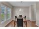 Cozy dining room with hardwood floors and lots of natural light at 960 Sandyhill Rd, Wendell, NC 27591
