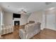 Comfortable living room features a fireplace and ample seating at 960 Sandyhill Rd, Wendell, NC 27591