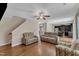 Open-concept living room connected to the kitchen with hardwood floors and cozy seating at 960 Sandyhill Rd, Wendell, NC 27591