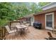 Outdoor living with an expansive back deck and outdoor furniture at 9801 Honeycutt Rd, Raleigh, NC 27614