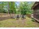 Picturesque backyard with a seating area for relaxation and enjoyment at 9801 Honeycutt Rd, Raleigh, NC 27614