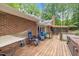 Well-maintained backyard deck area with seating and backyard access at 9801 Honeycutt Rd, Raleigh, NC 27614