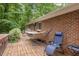 Relaxing backyard deck with a hammock and comfortable seating area at 9801 Honeycutt Rd, Raleigh, NC 27614
