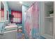 bathroom featuring double sinks and pink and blue mermaid theme at 9801 Honeycutt Rd, Raleigh, NC 27614