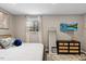 Well-lit bedroom featuring modern decor, a comfortable bed, and stylish furnishings at 9801 Honeycutt Rd, Raleigh, NC 27614