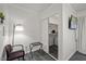 Bright and well-organized bedroom with closet and in-room seating at 9801 Honeycutt Rd, Raleigh, NC 27614