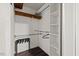 Bright closet features shelving, rack, and wood flooring, offering ample storage space at 9801 Honeycutt Rd, Raleigh, NC 27614