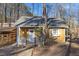 Charming cottage with white picket fence and manicured lawn at 9801 Honeycutt Rd, Raleigh, NC 27614
