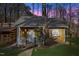 Charming cottage with white picket fence and manicured lawn at 9801 Honeycutt Rd, Raleigh, NC 27614