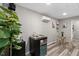 Modern kitchenette with stainless steel appliances and stylish dining area at 9801 Honeycutt Rd, Raleigh, NC 27614