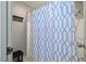 Shower featuring decorative shower curtain, shower head, and a built-in bench and shelf at 9801 Honeycutt Rd, Raleigh, NC 27614