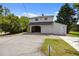 Quaint detached garage with upper level, features a two-car garage and convenient side door access at 1000 College St, Oxford, NC 27565