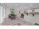 Comfortable living room with bar and staircase at 101 Quarryrock Rd, Holly Springs, NC 27540