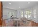 Bright office with large windows, wood floors, and stylish decor at 101 Quarryrock Rd, Holly Springs, NC 27540