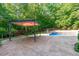 Backyard pool with a relaxing gazebo area, perfect for outdoor entertaining and leisure at 101 Quarryrock Rd, Holly Springs, NC 27540