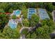 Aerial shot features a community pool and tennis courts, perfect for active residents at 102 Turnberry Ln, Cary, NC 27518