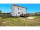 Home's backyard with a wooden fence and deck at 102 Williamson Place Dr, Princeton, NC 27569