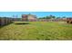 Spacious backyard featuring a wooden fence and trampoline at 102 Williamson Place Dr, Princeton, NC 27569