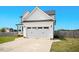 Charming home with a well-kept lawn and an attached two-car garage at 102 Williamson Place Dr, Princeton, NC 27569