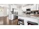 Kitchen with stainless steel appliances, granite countertops, and breakfast bar seating at 102 Williamson Place Dr, Princeton, NC 27569