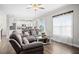 Open-concept living space seamlessly connecting the living room and kitchen at 102 Williamson Place Dr, Princeton, NC 27569