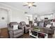 Spacious living room leading into the kitchen, perfect for entertaining guests at 102 Williamson Place Dr, Princeton, NC 27569