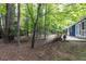 A peaceful wooded yard flanks the rear of this home offering a tranquil setting at 103 Summerlin Dr Dr, Chapel Hill, NC 27514