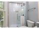 Bathroom with a glass walk-in shower, white subway tile, and a neutral-toned vanity at 103 Summerlin Dr Dr, Chapel Hill, NC 27514