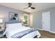 Comfortable bedroom featuring natural light from a window, a ceiling fan and an inviting bed at 103 Summerlin Dr Dr, Chapel Hill, NC 27514